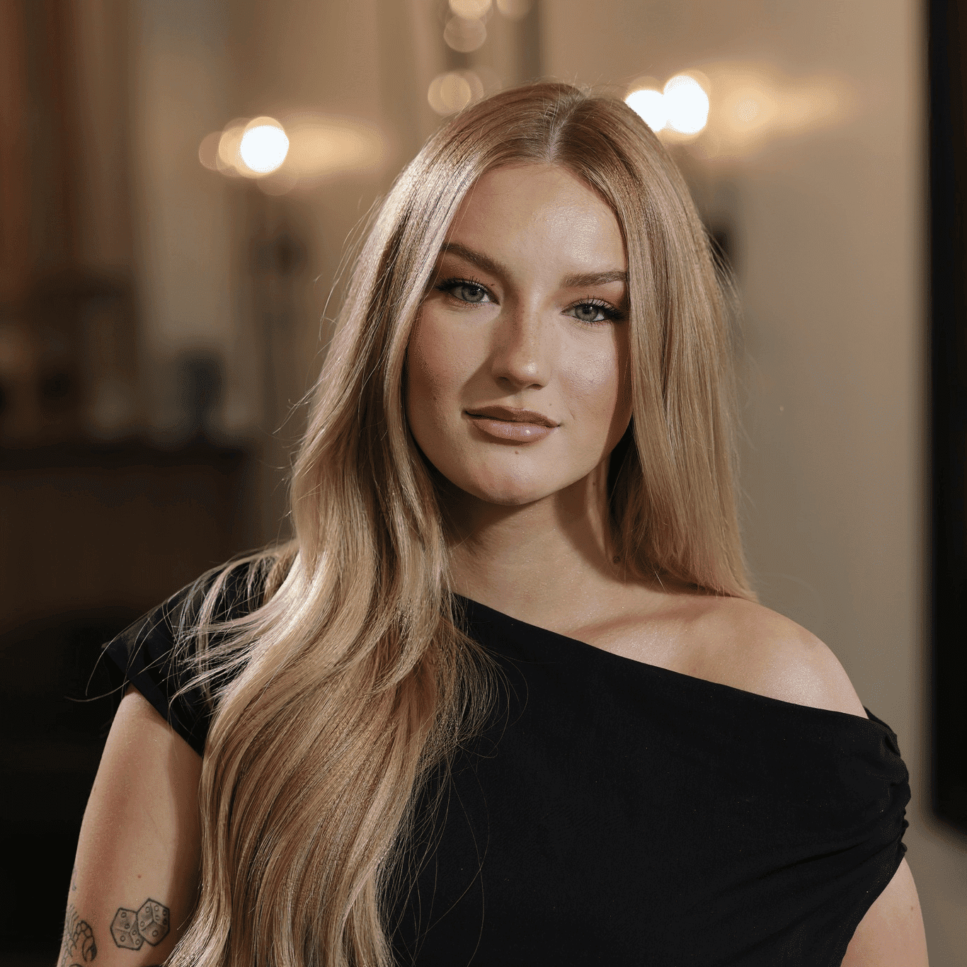 Portrait of Madison McKay, a professional stylist at Atelier, showcasing their expertise and style.