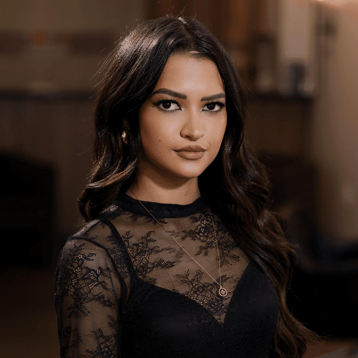 Portrait of Haylea Ellis, a professional stylist at Atelier, showcasing their expertise and style.