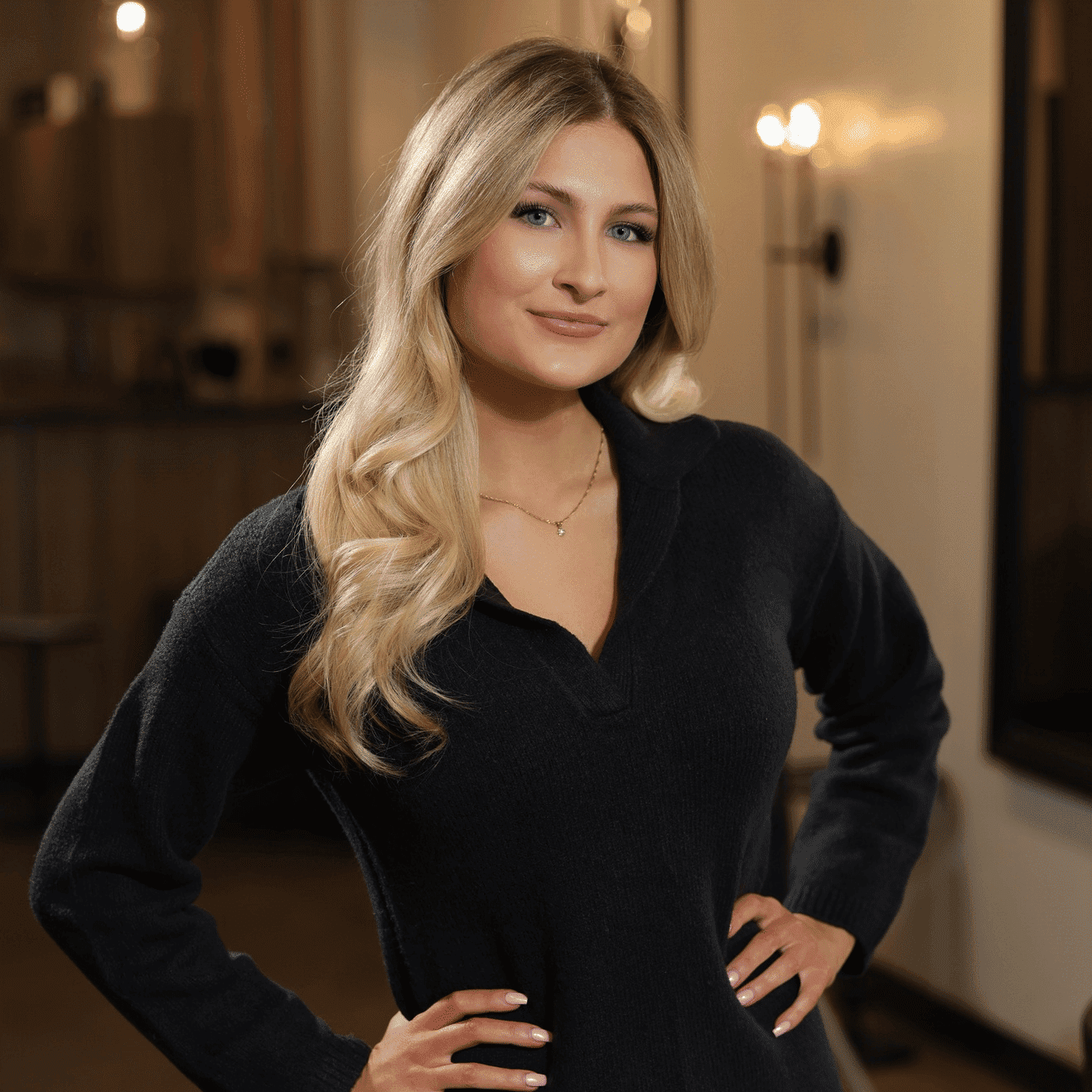 Portrait of Sami Baldigowski, a professional stylist at Atelier, showcasing their expertise and style.