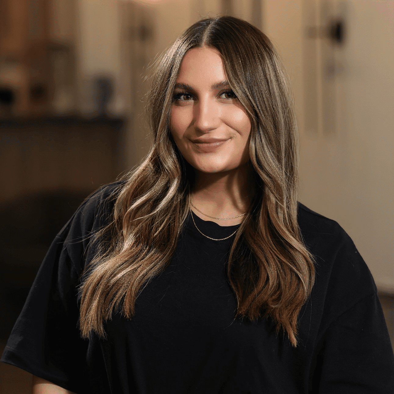 Portrait of Maria Gagetta, a professional stylist at Atelier, showcasing their expertise and style.