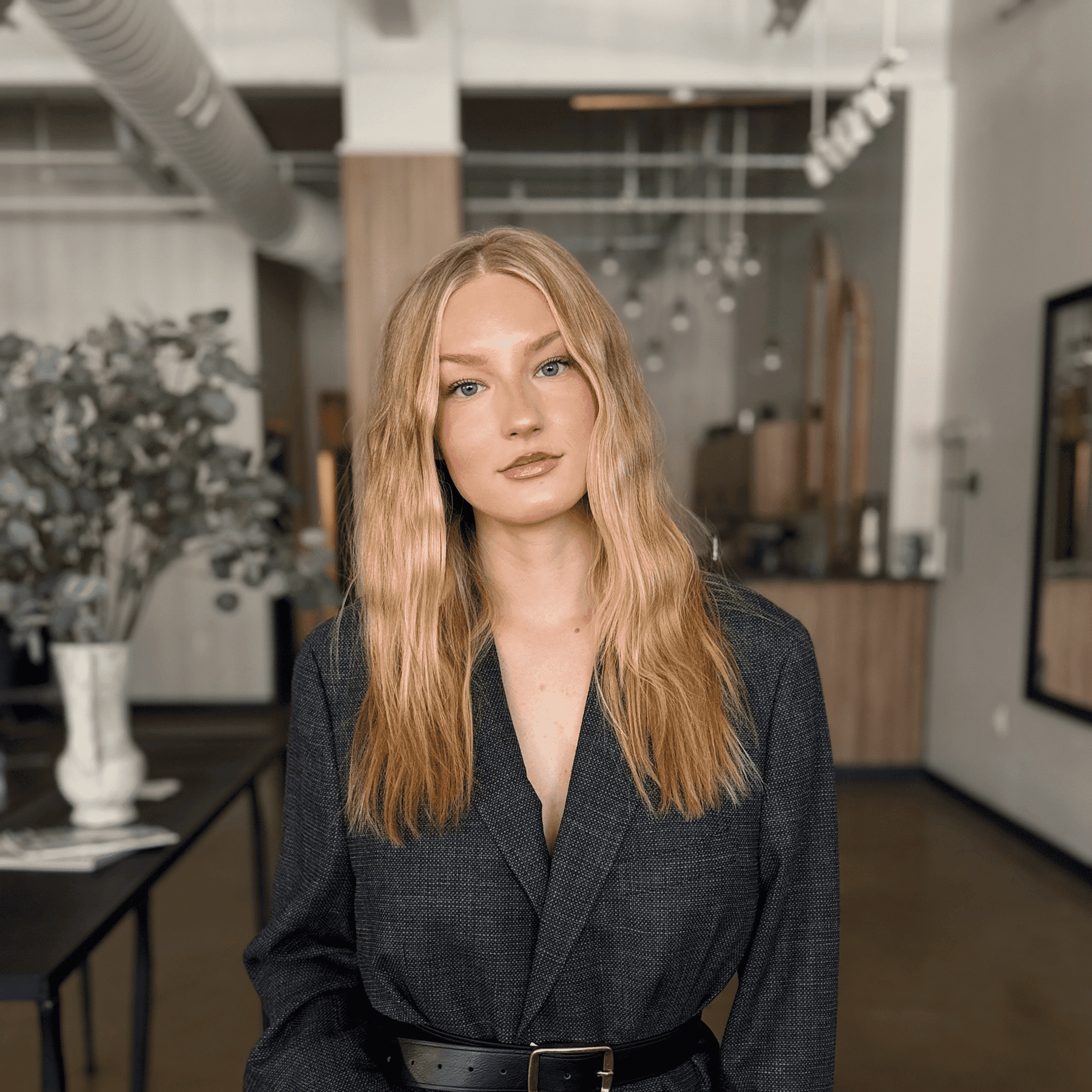 Portrait of Madison McKay, a professional stylist at Atelier, showcasing their expertise and style.