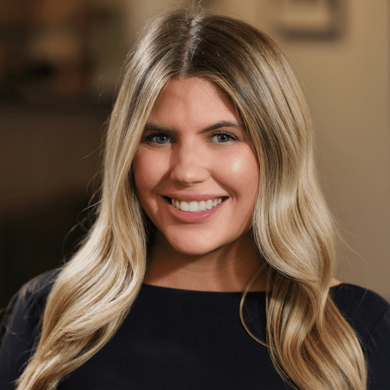 Portrait of Alicia Tresky, a professional stylist at Atelier, showcasing their expertise and style.